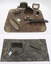 TWO 1920'S DESK SETS. The firs