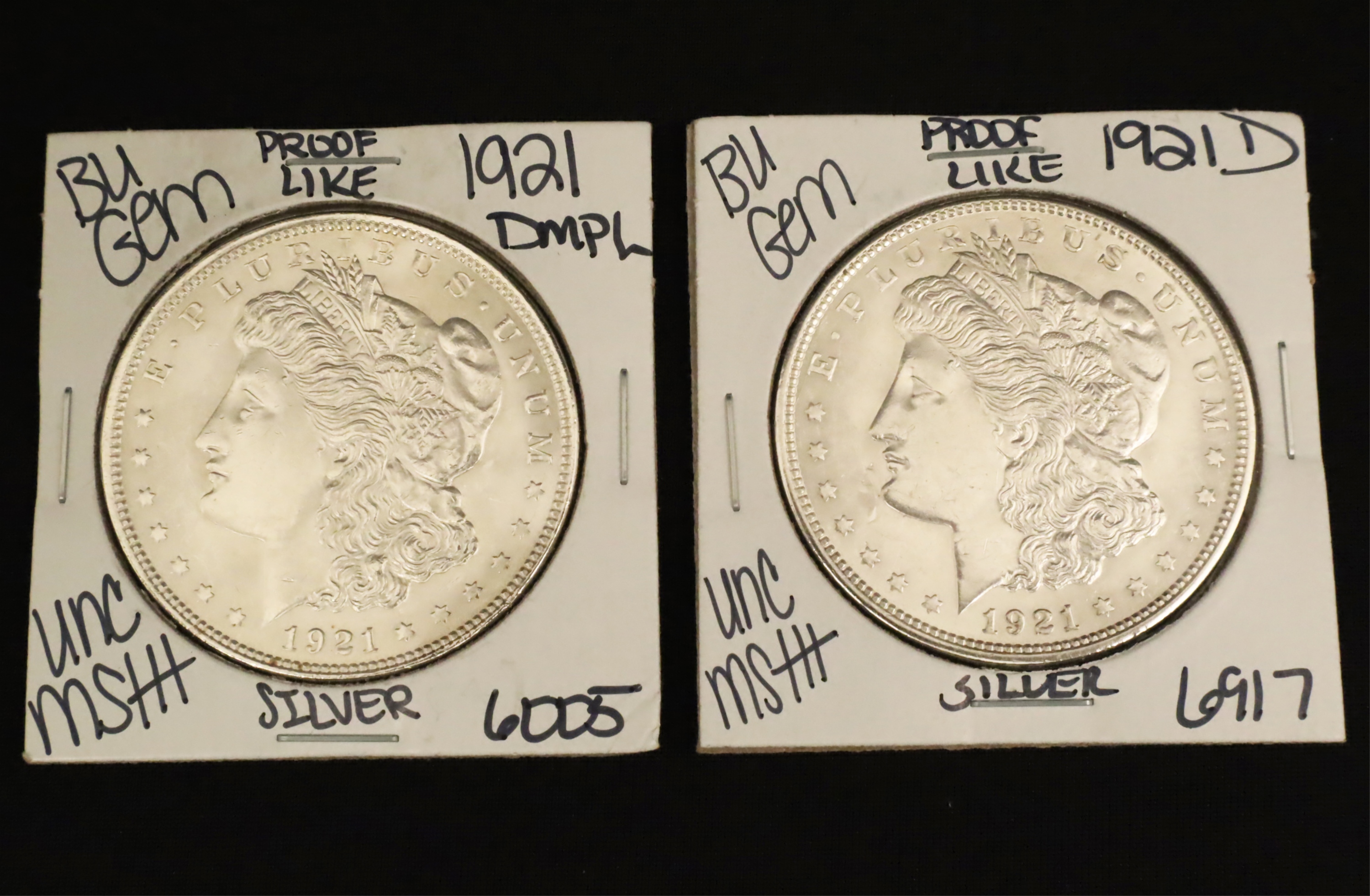 TWO 1921 BU MORGAN SILVER DOLLARS