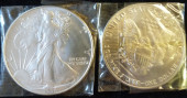 TWO 1986 AMERICAN EAGLE .999 S
