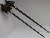 TWO 19TH C BASKET HILTED SWORD