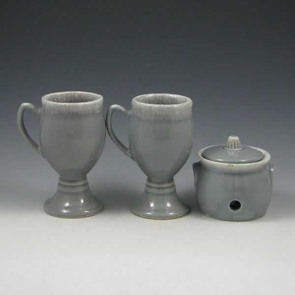 Two (2) Hull Cups and One Garlic