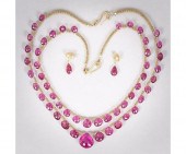 Two 22k gold and pink tourmali