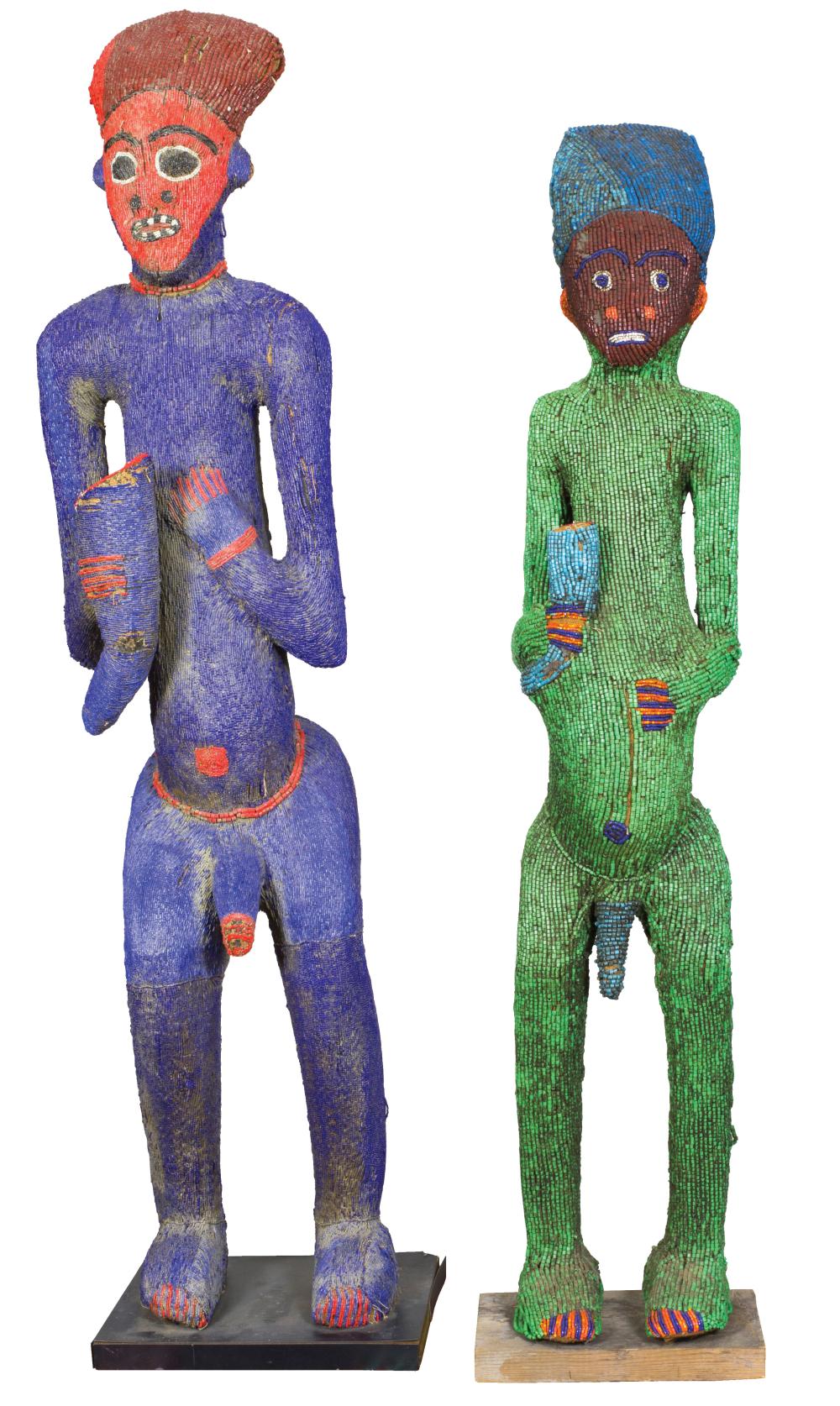 TWO AFRICAN BEADED WOOD MALE