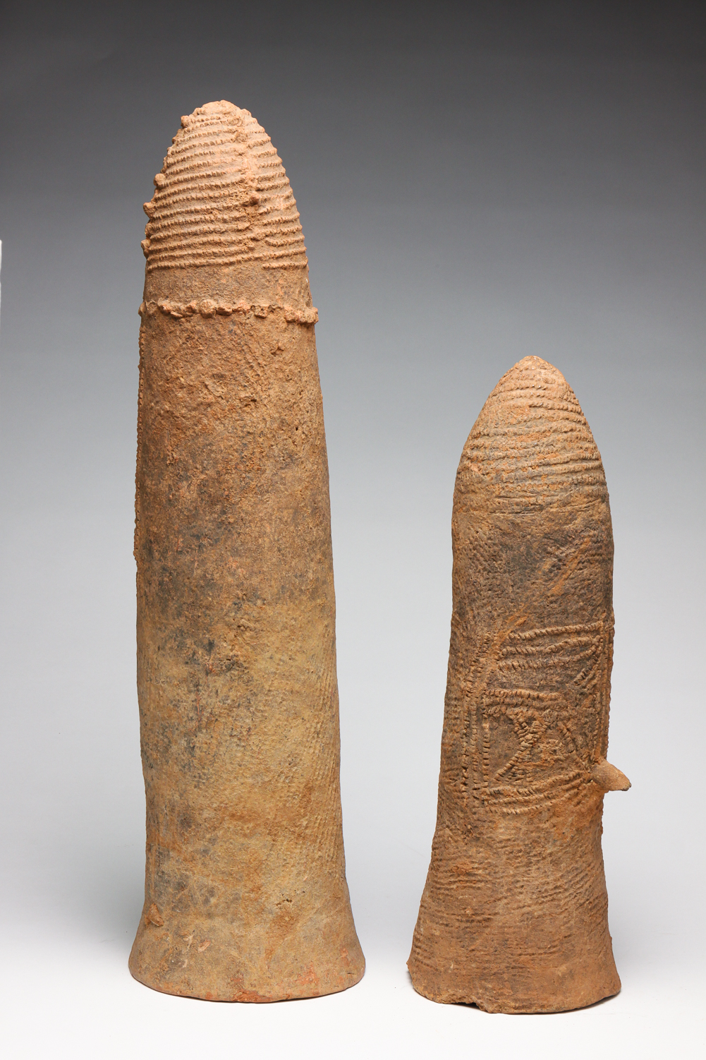 TWO AFRICAN BURA TERRA COTTA