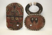 TWO AFRICAN CARVED AND PIGMENT