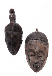 TWO AFRICAN CARVED WOOD CRESTE