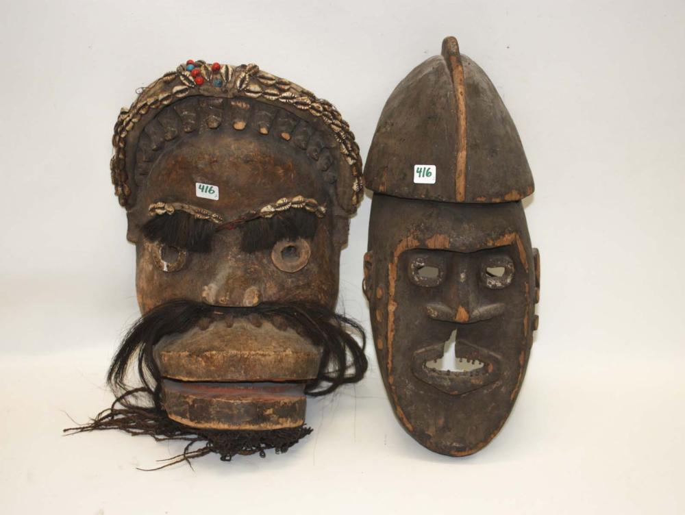 TWO AFRICAN CARVED WOOD MASKS: 17"L