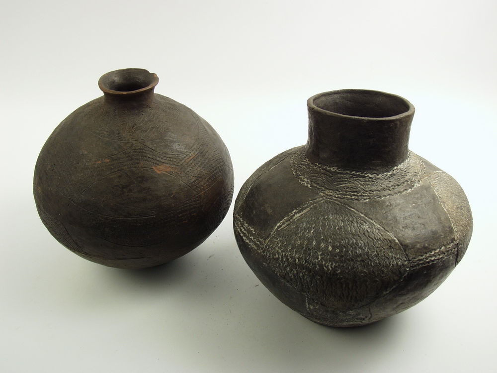 TWO AFRICAN TERRA COTTA JUGS -