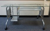TWO ALUMINUM GLASS TOP DESKS O