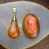 TWO AMBER AND FOURTEEN KARAT G