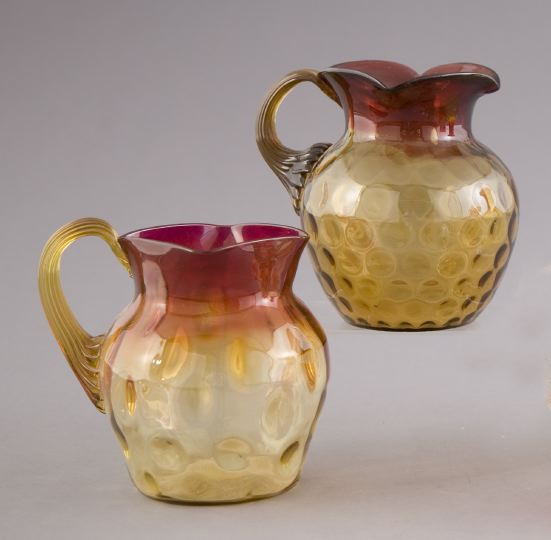 Two "Amberina" Glass Pitchers, 