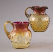 Two "Amberina" Glass Pitchers,