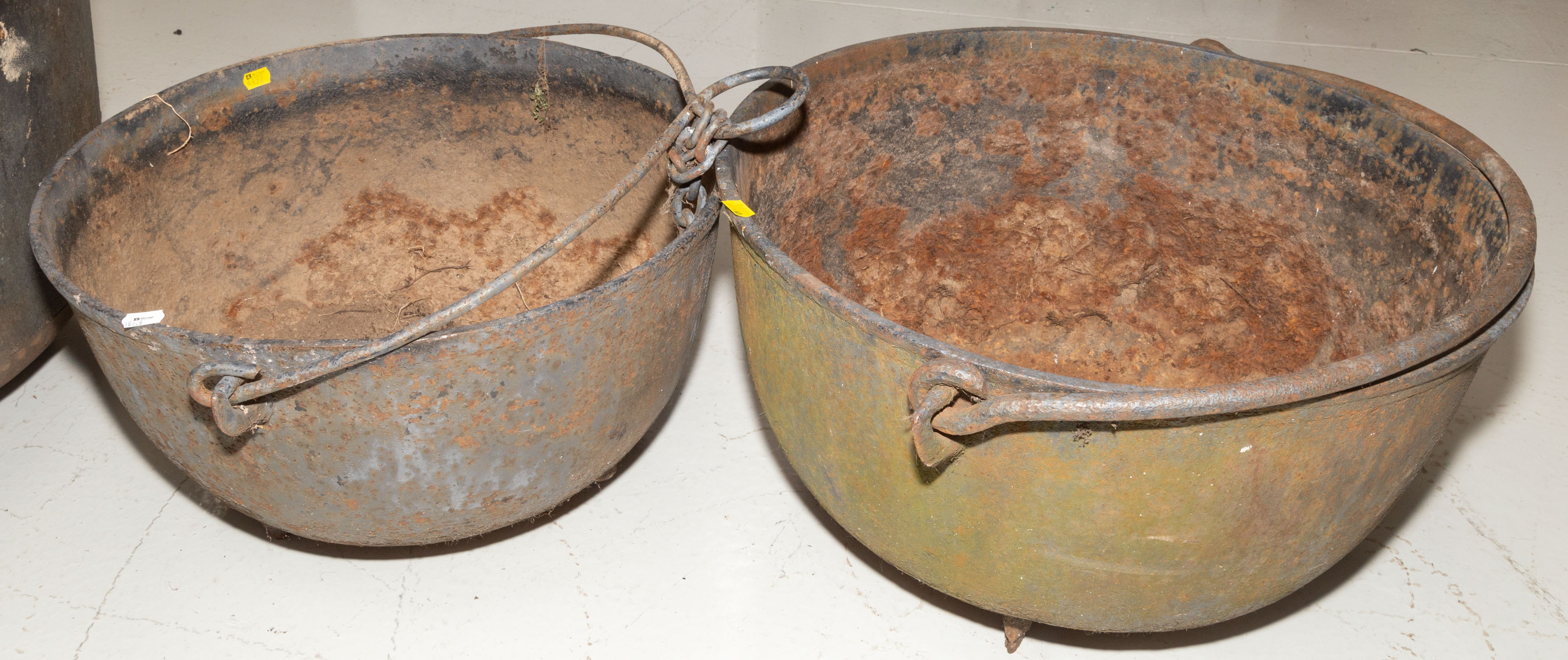 TWO AMERICAN CAST IRON CAULDRONS
