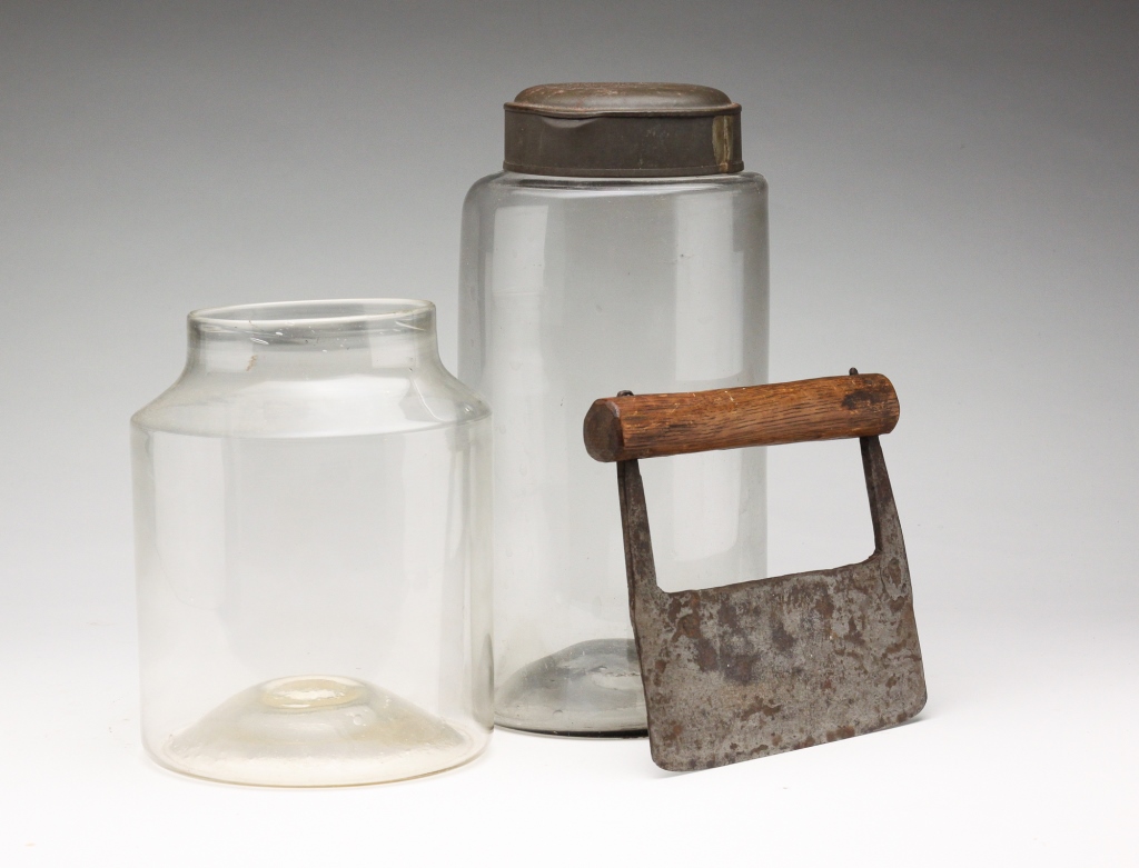 TWO AMERICAN GLASS CANISTERS AND AN