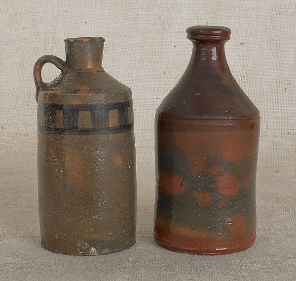 Two American redware bottles 19th