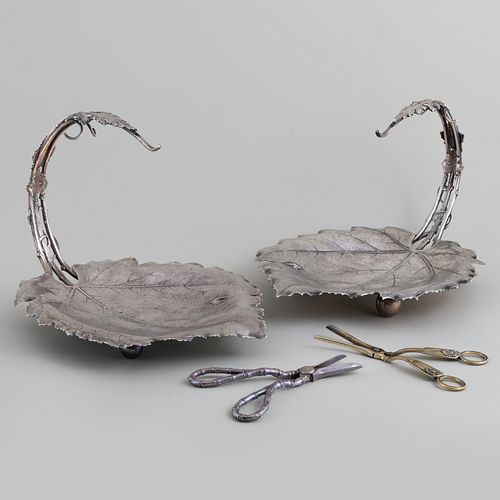 TWO AMERICAN SILVER GRAPE CRADLES