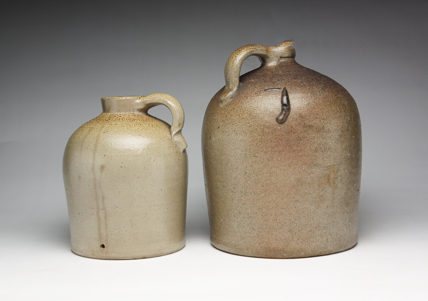 TWO AMERICAN STONEWARE JUGS. Second