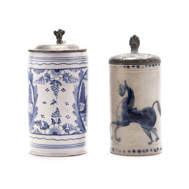 TWO ANTIQUE BLUE AND WHITE STEINS