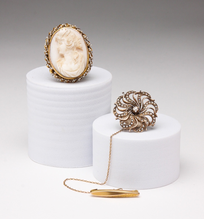 TWO ANTIQUE BROOCHES/PENDANTS.