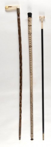 TWO ANTIQUE CANES AND A WALKIN