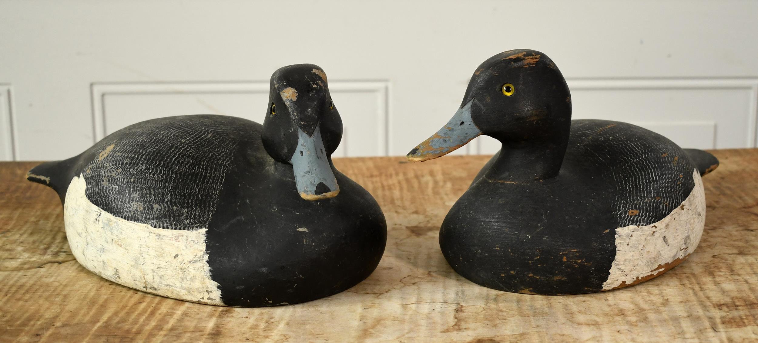 TWO ANTIQUE CARVED AND PAINTED