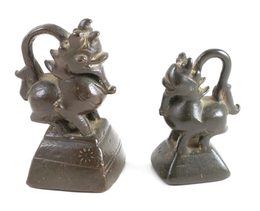 TWO ANTIQUE CHINESE BRONZE OPIUM