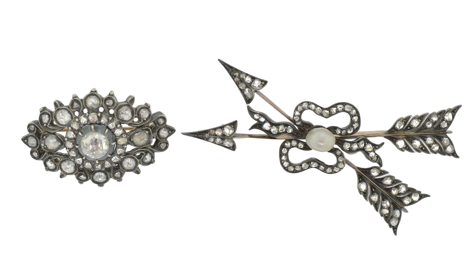 TWO ANTIQUE DIAMOND SET PINS.