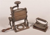 TWO ANTIQUE FLUTING IRONS.Two