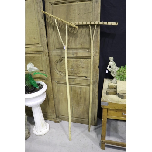 Two antique French wooden rakes,