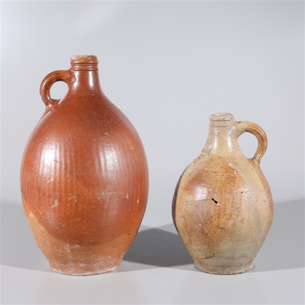Two antique German bellarmine jugs,