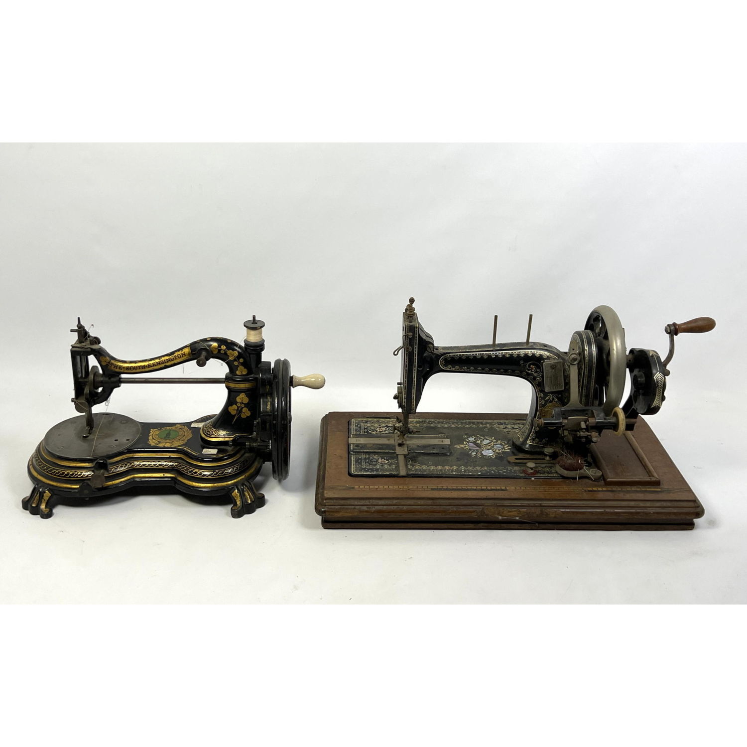 Two Antique Iron Sewing Machines.