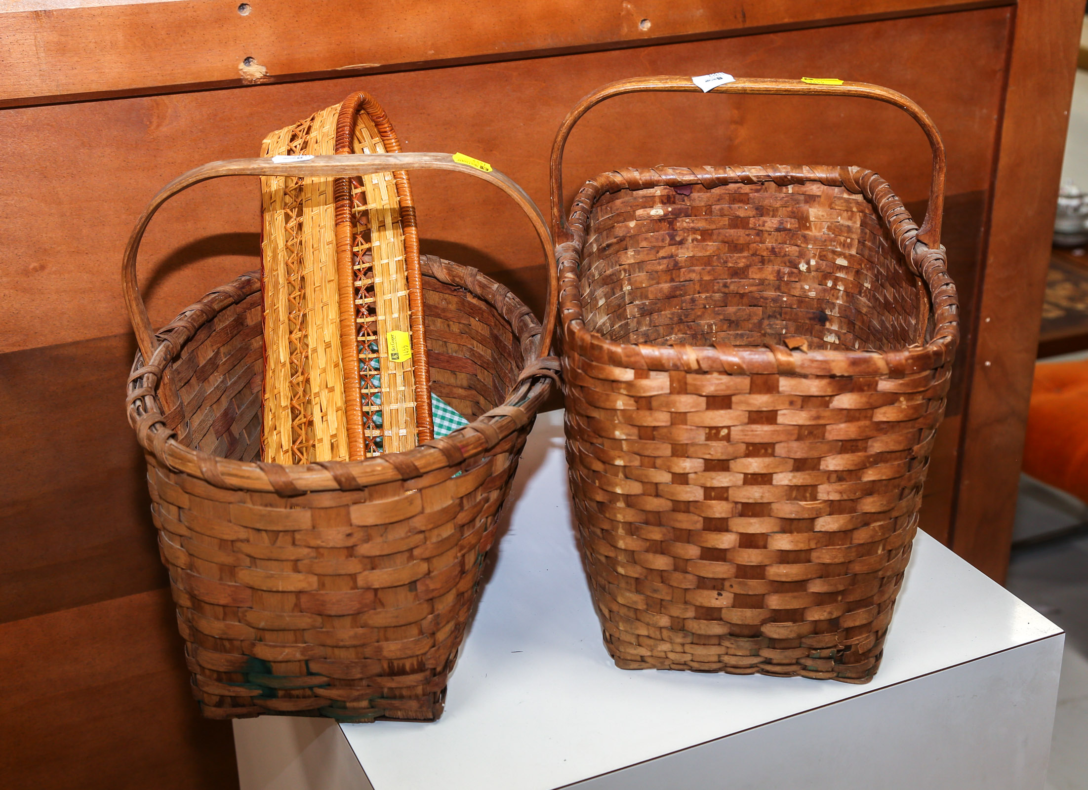 TWO ANTIQUE & ONE MODERN BASKET .