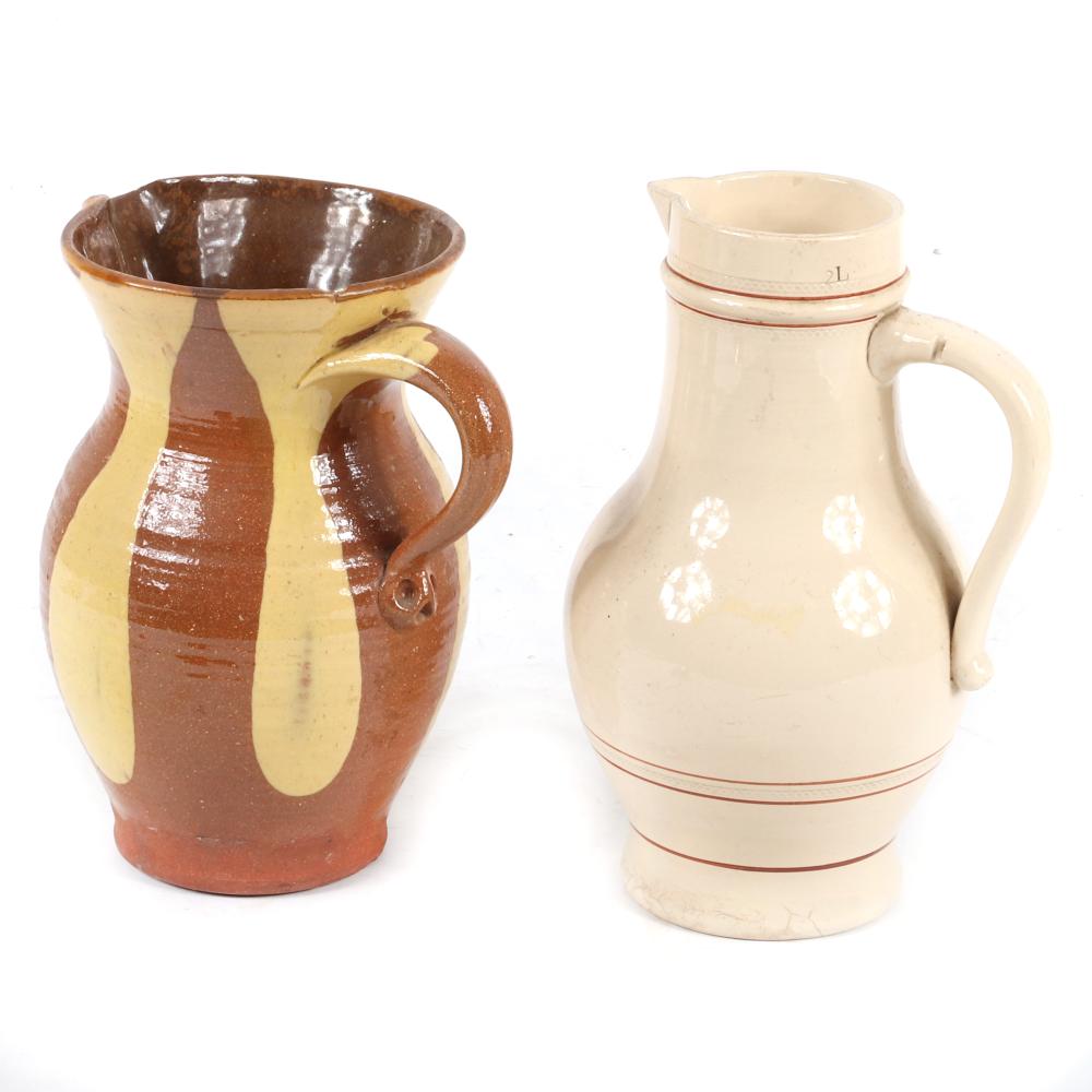 TWO ANTIQUE POTTERY PITCHERS;