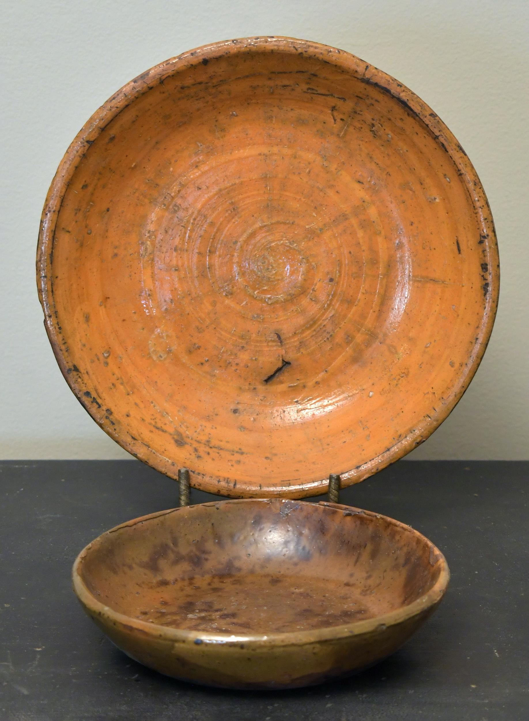 TWO ANTIQUE REDWARE BOWLS. A