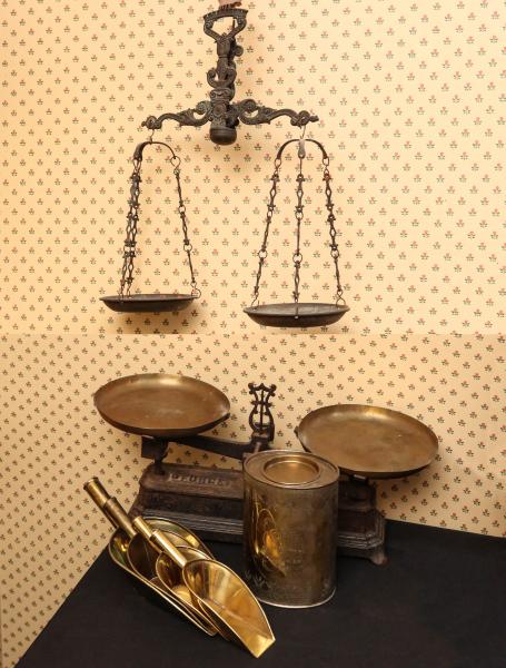 TWO ANTIQUE SCALES, FOUR BRASS