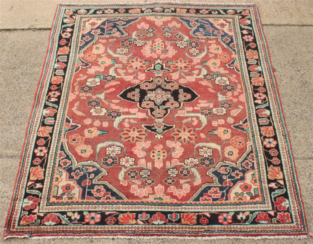 TWO ANTIQUE TRIBAL RUGS the first