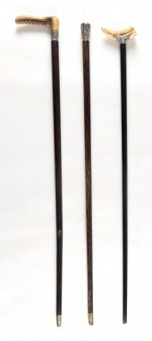 TWO ANTIQUE WALKING STICKS AND