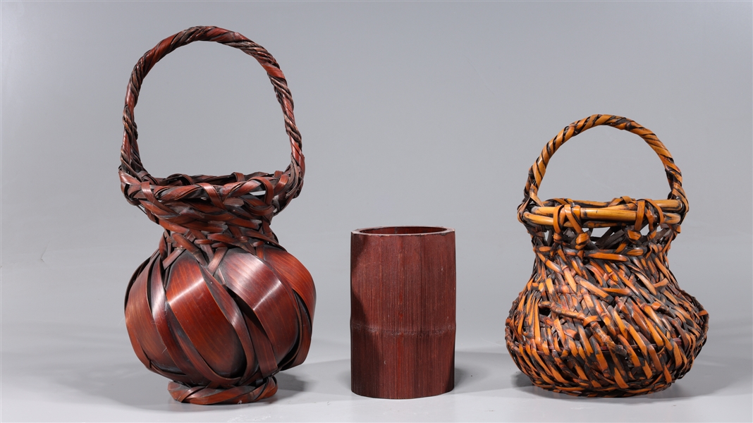 Two antique woven Ikebana