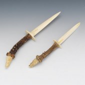 TWO ANTLER AND CARVED BONE PAG