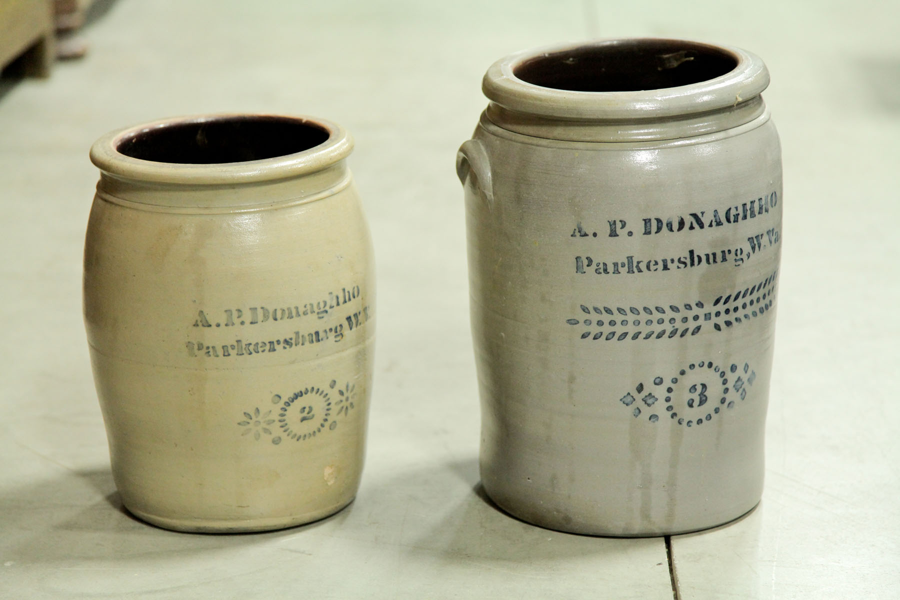 TWO A.P. DONAGHHO CROCKS. 