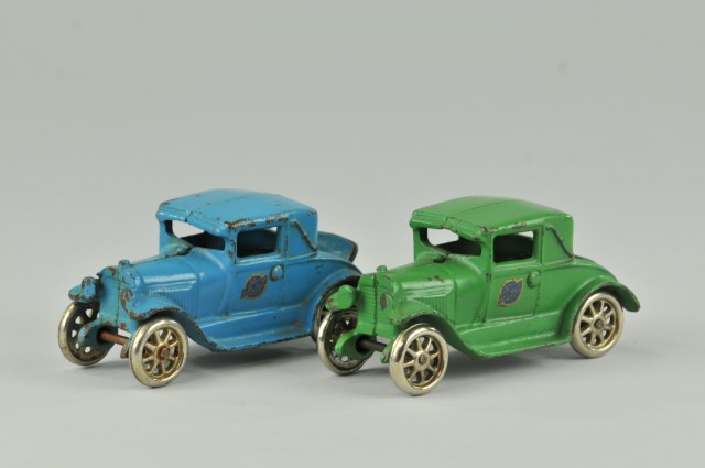 TWO ARCADE FORD MODEL 'A' COUPES c.