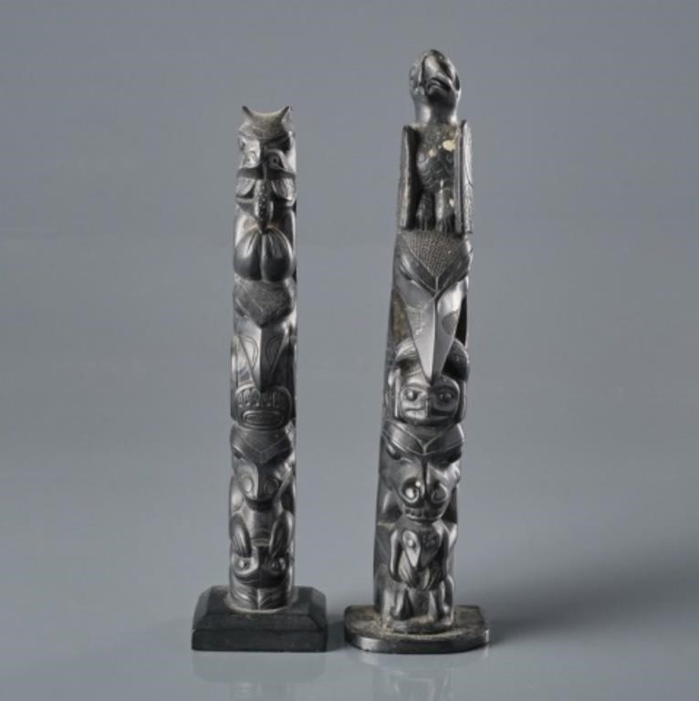 TWO ARGILITE TOTEM STYLE