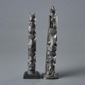 TWO ARGILITE TOTEM STYLE SCULP
