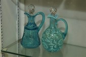 TWO ART GLASS CRUETS. A blue B