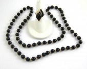 TWO ARTICLES OF BLACK ONYX JEW