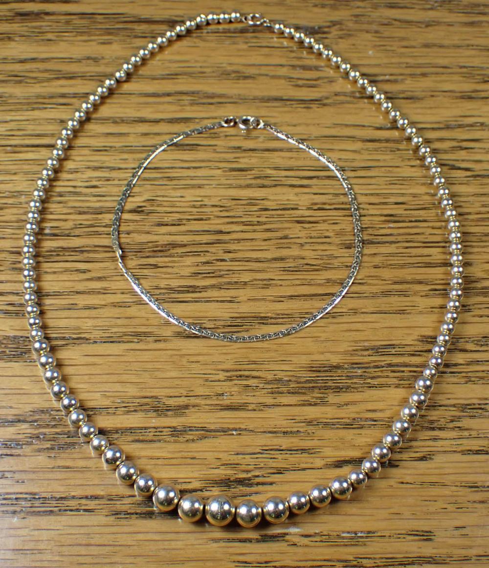 TWO ARTICLES OF FOURTEEN KARAT GOLD