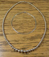 TWO ARTICLES OF FOURTEEN KARAT