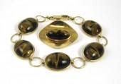 TWO ARTICLES OF TIGER'S EYE JE