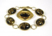 TWO ARTICLES OF TIGER'S EYE JE