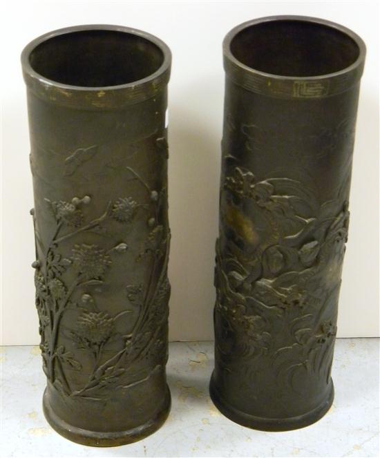 Two Asian brass cylindrical vessels